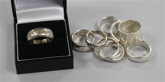 A Tiffany & Co silver Russian triple ring, six Wright & Teagle silver rings and one other silver ring.